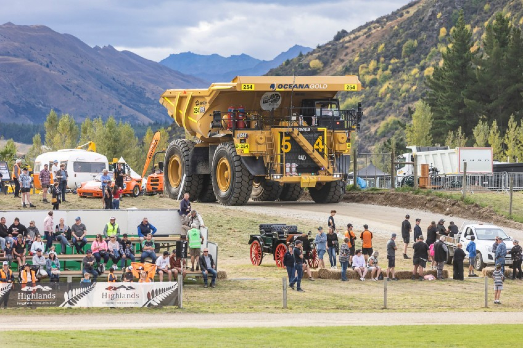 Wheels at Wanaka Neil Kerr OceanaGolds Cat 789 dump truck makes its way into the parade ground at Wheels at Wanaka ScaleWidthWzg0OF0 CropHeightWyI2MDAiXQ